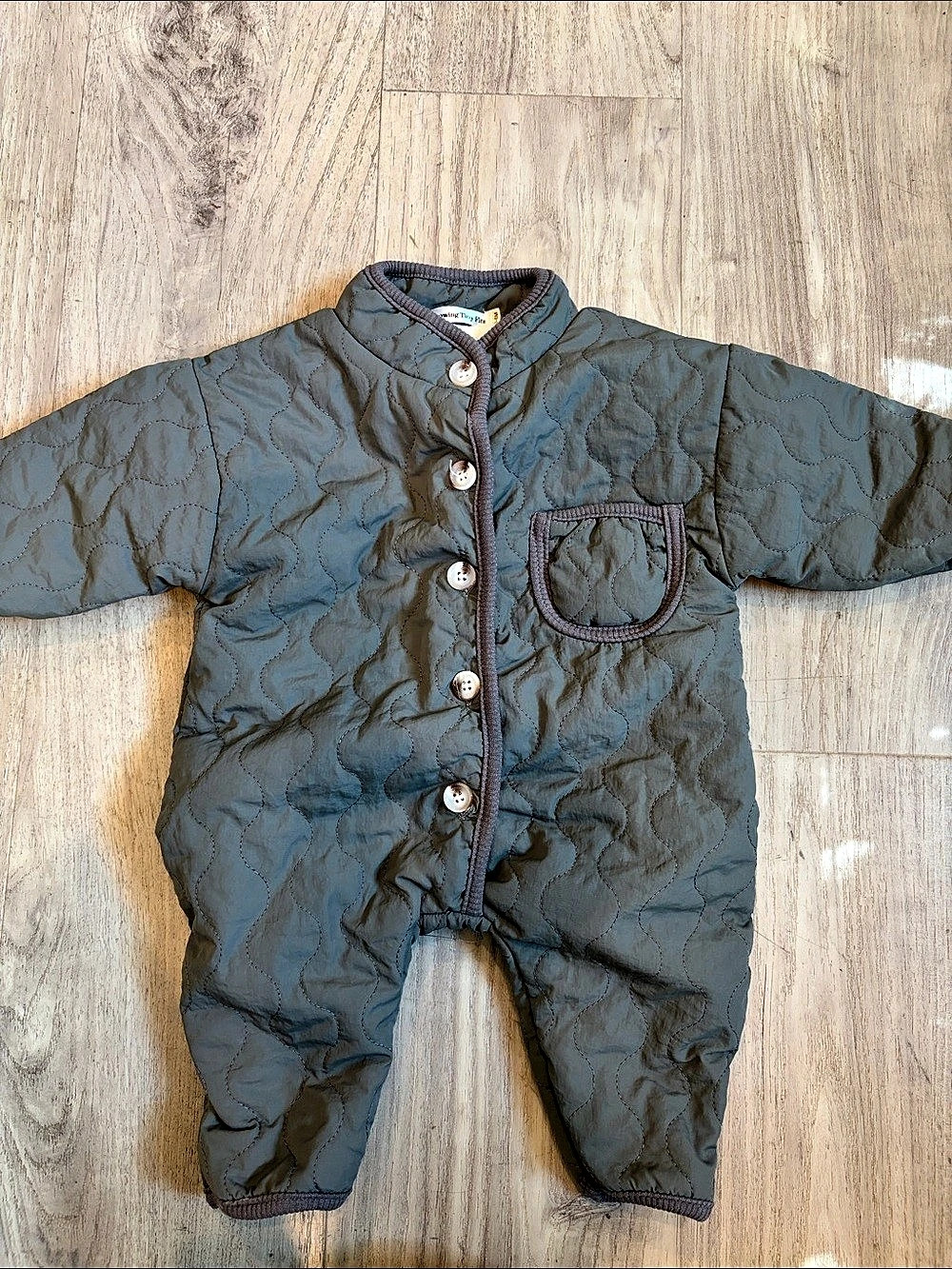 Throwing Tiny Fits baby fleece lined bunting suit 0-6 months
